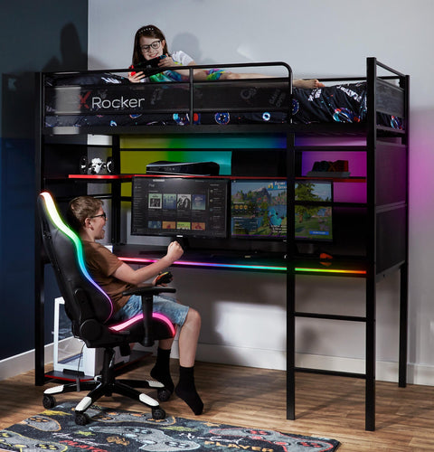 X Rocker Battlebunk RGB – a space-saving gaming bed with a built-in desk, multi-monitor setup, and LED lighting effects.
