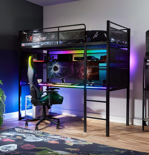 Gaming room setup with a high chair, desk, and computer setup.